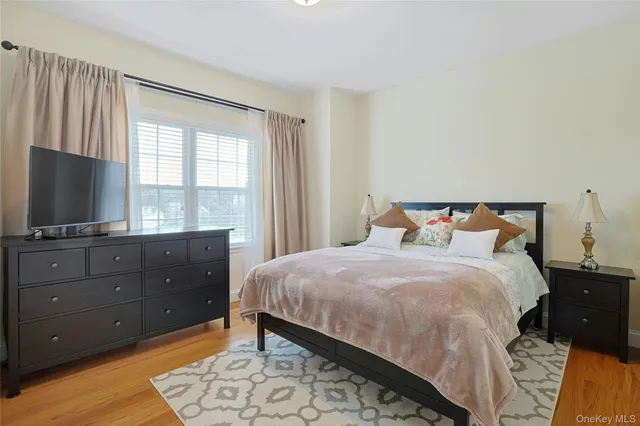 a bathroom with a sink a mirror and a shower