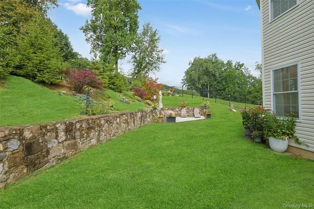 an aerial view of a house with a garden