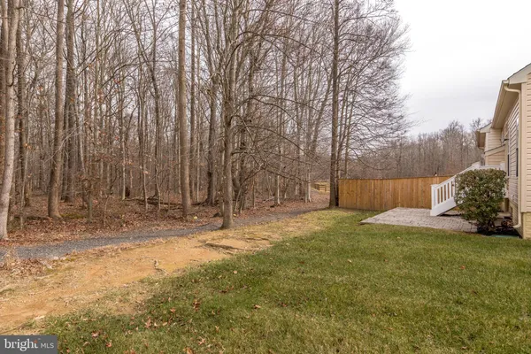 a fire hydrant in the middle of a field