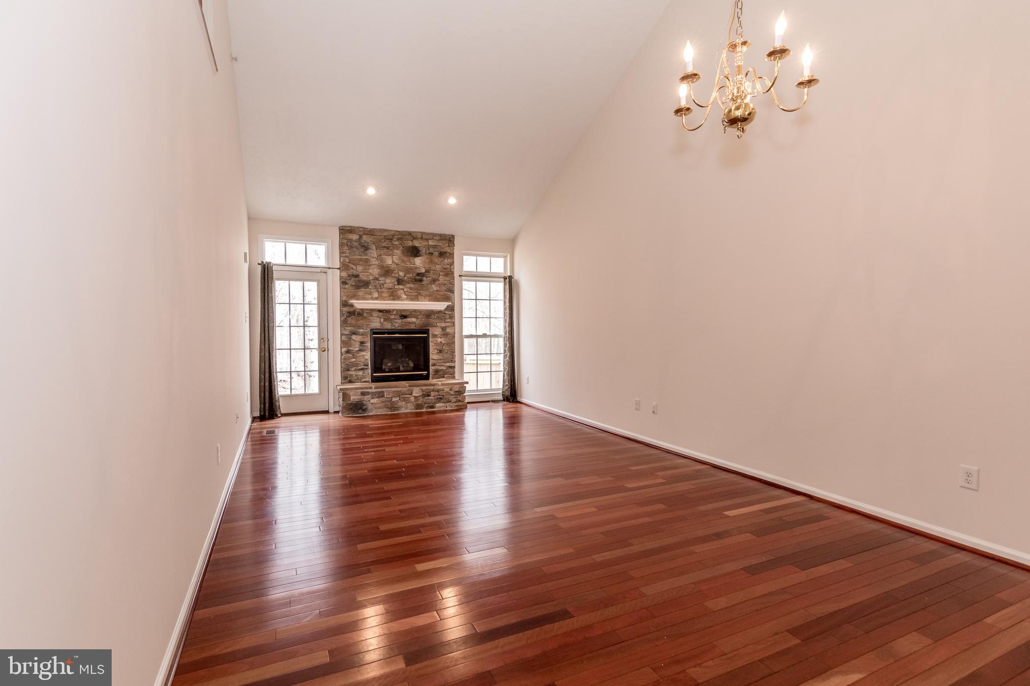 5035 Woods Line Drive, Unit 18 Aberdeen, MD 21001 - Photo 7 of 30 Living room/family room with fireplace