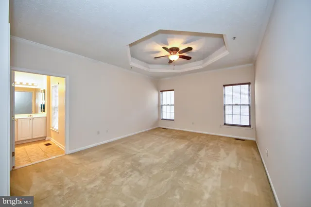 a bathroom with a granite countertop sink mirror and