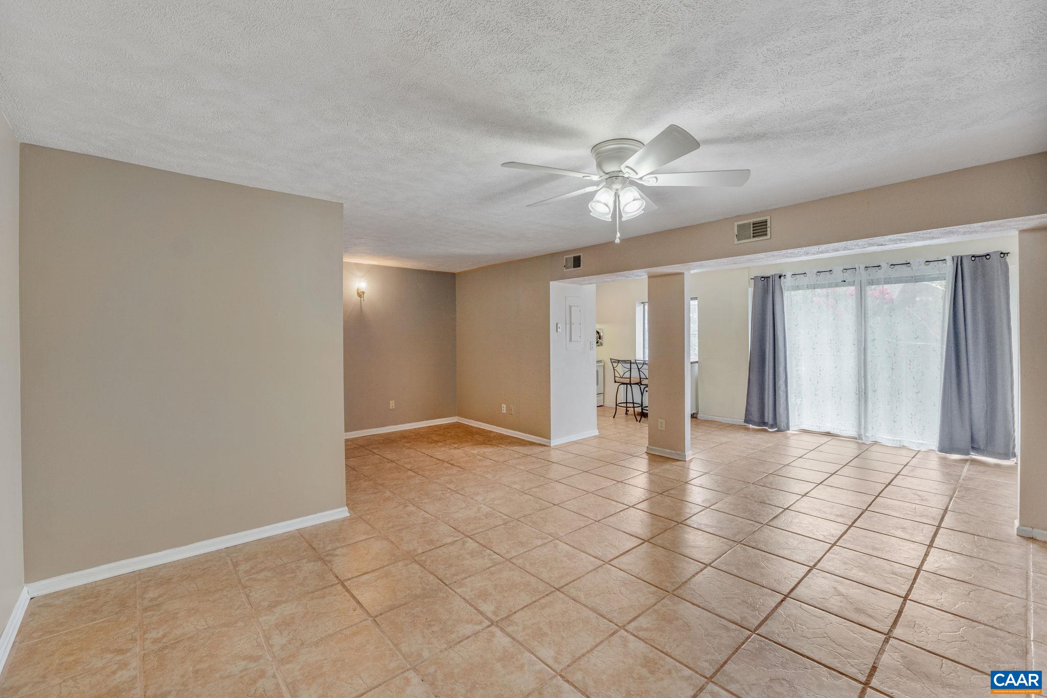 33 Spring Court Charlottesville, VA 22901 - Photo 12 of 26 a view of an empty room with a ceiling fan