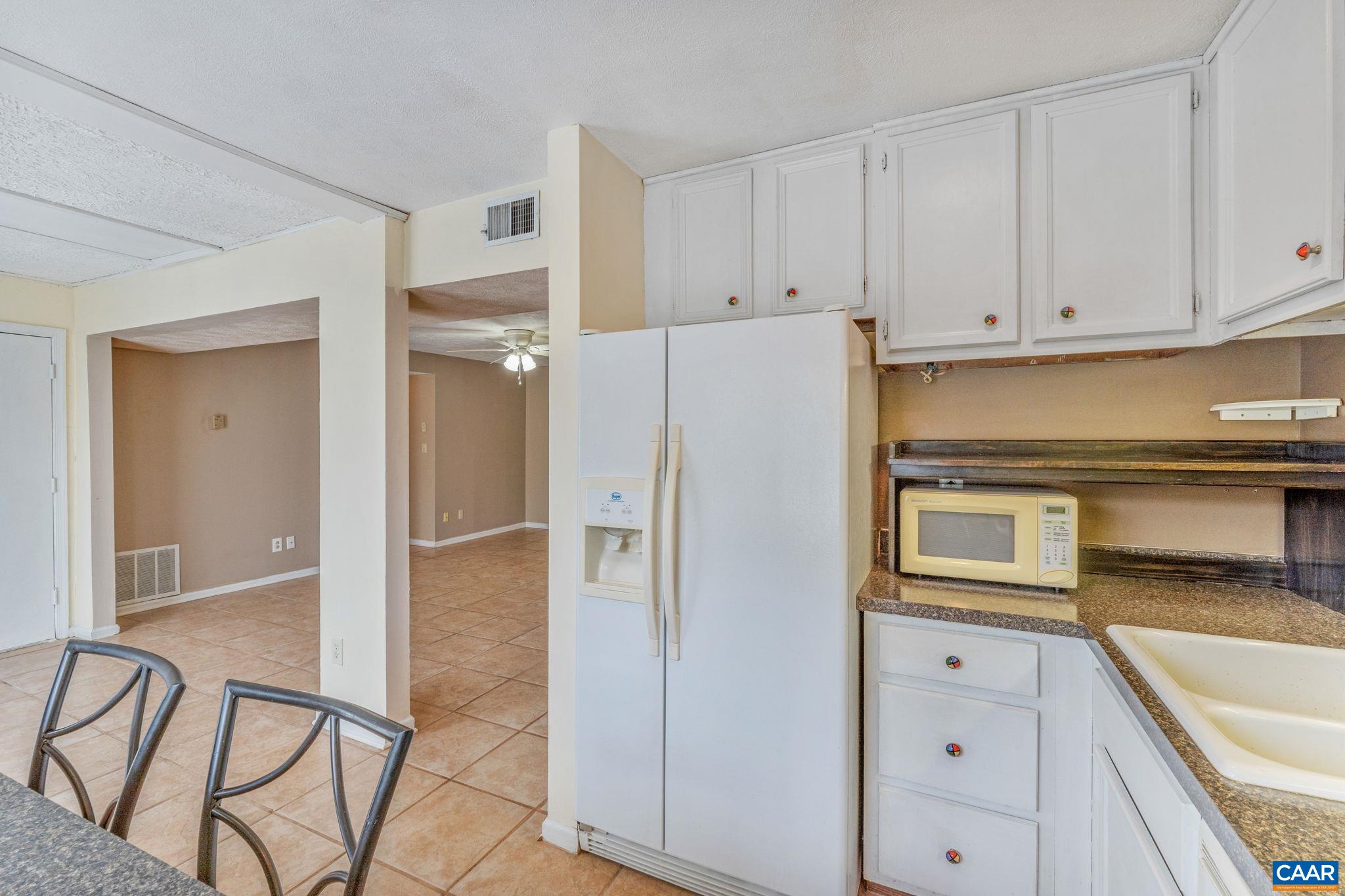 33 Spring Court Charlottesville, VA 22901 - Photo 17 of 26 a kitchen with stainless steel appliances granite countertop a refrigerator and a sink
