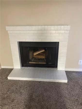 a living room with a fireplace