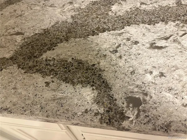 a view of a dry yard with wooden floor