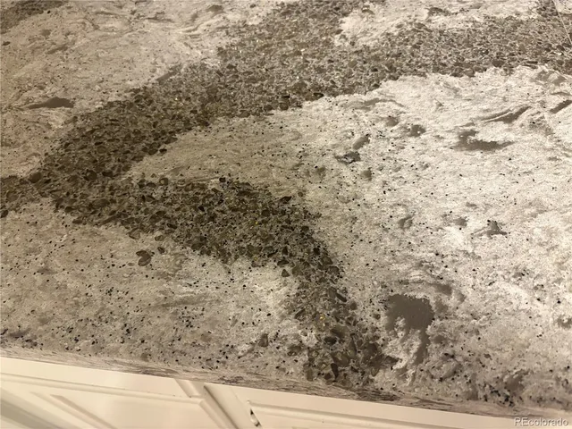 a view of a dry yard with wooden floor