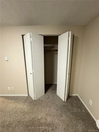 an empty room with closet