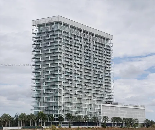 a view of a building with a yard