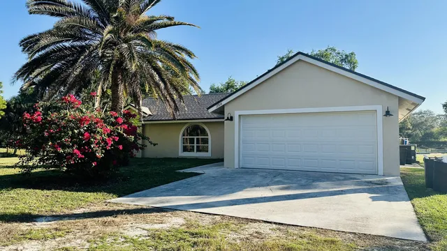 a front view of house with yard