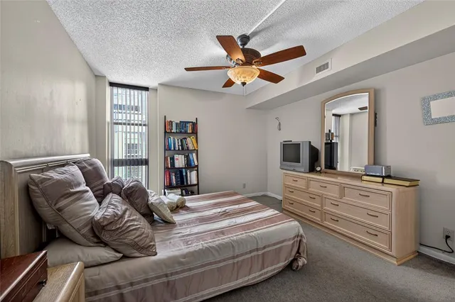 front view of a building with a garden