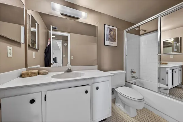 a view of a swimming pool with outdoor seating