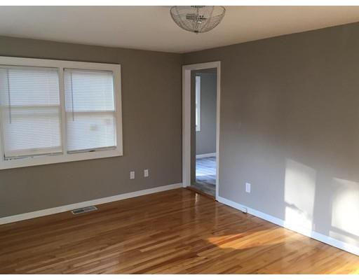 91 Windemere Street Springfield, MA 01104 - Photo 16 of 28 a view of empty room with wooden floor and fan