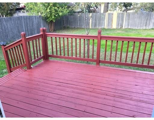 91 Windemere Street Springfield, MA 01104 - Photo 21 of 28 a view of deck with wooden floor and fence
