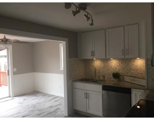 91 Windemere Street Springfield, MA 01104 - Photo 3 of 28 a kitchen with a sink and cabinets