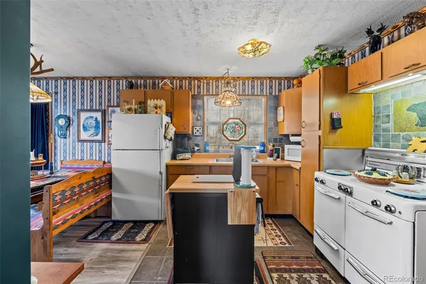 a storage room with washer and dryer