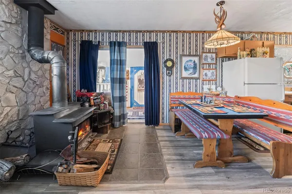 a room with gym equipment and windows