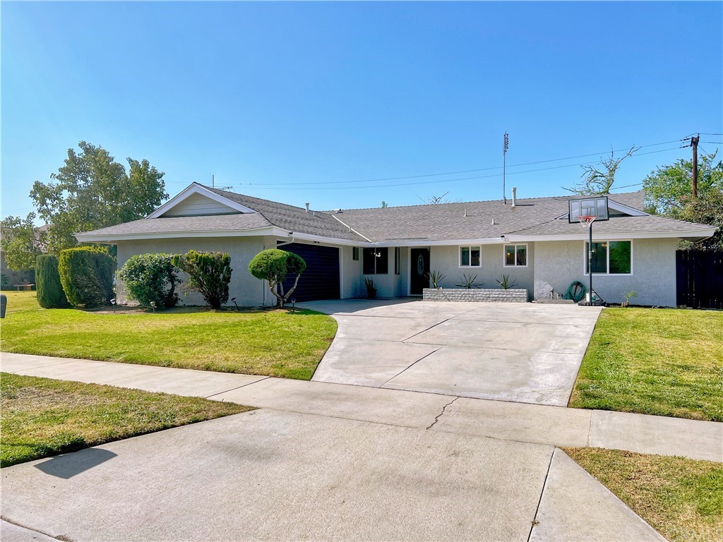 4182 Donald Avenue Riverside, CA 92503 - Photo 1 of 1 a front view of a house with a yard
