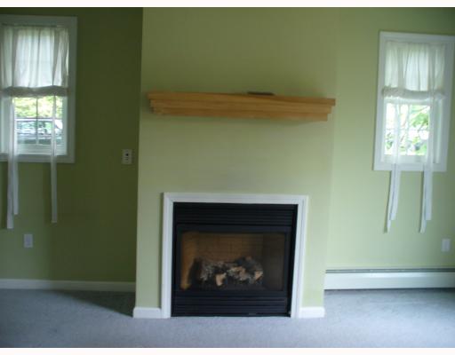 14 3rd Street Warren, RI 02885 - Photo 5 of 12 Living Room. Living room with gas fireplace