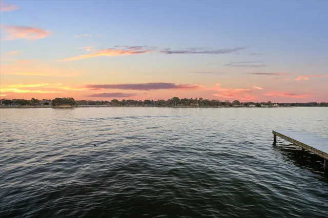 a view of a city with lawn chairs