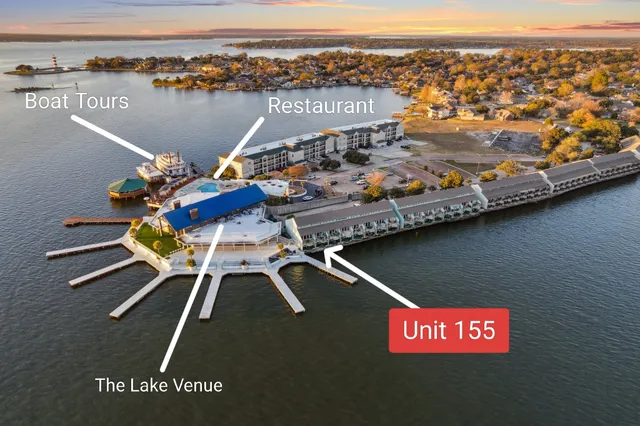 a view of a lake with a big yard