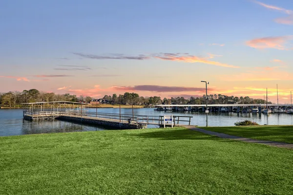a view of a lake with a big yard