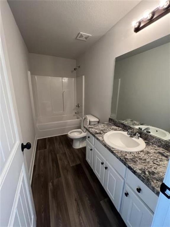 1389 River Mist Circle Jefferson, GA 30549 - Photo 16 of 18 a bathroom with a granite countertop sink and a mirror