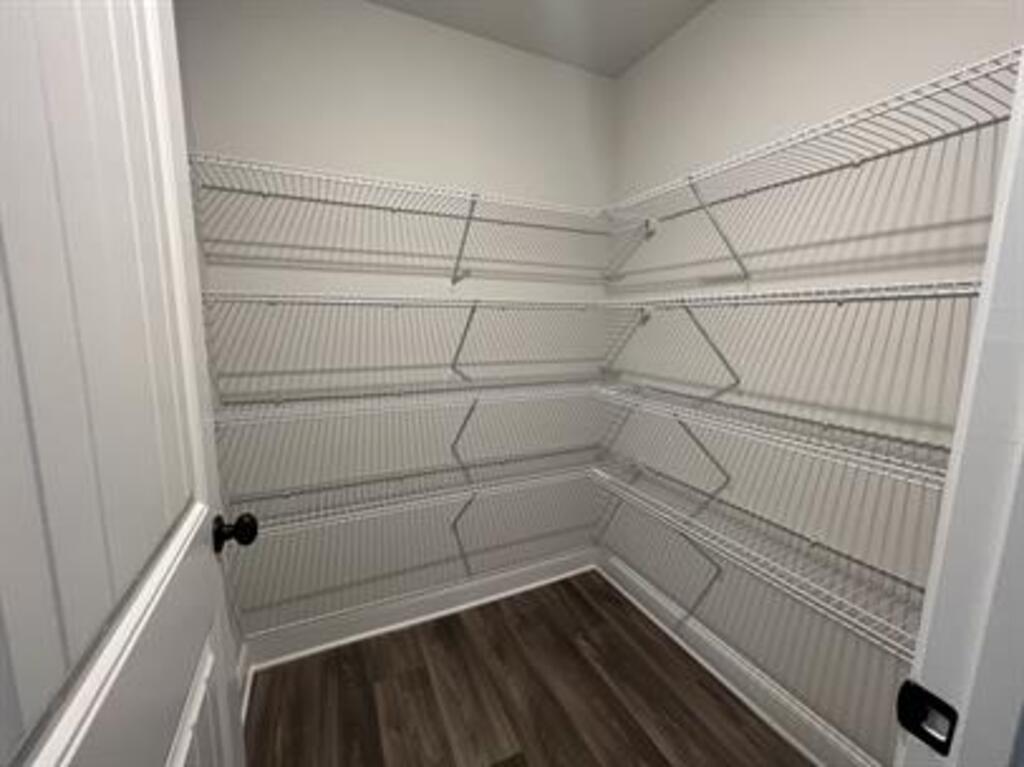 1389 River Mist Circle Jefferson, GA 30549 - Photo 7 of 18 a view of a room with racks on the wall