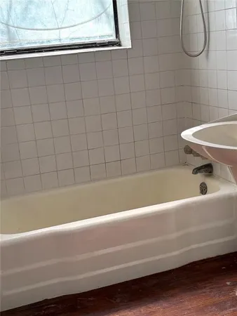 a bathroom with a bathtub