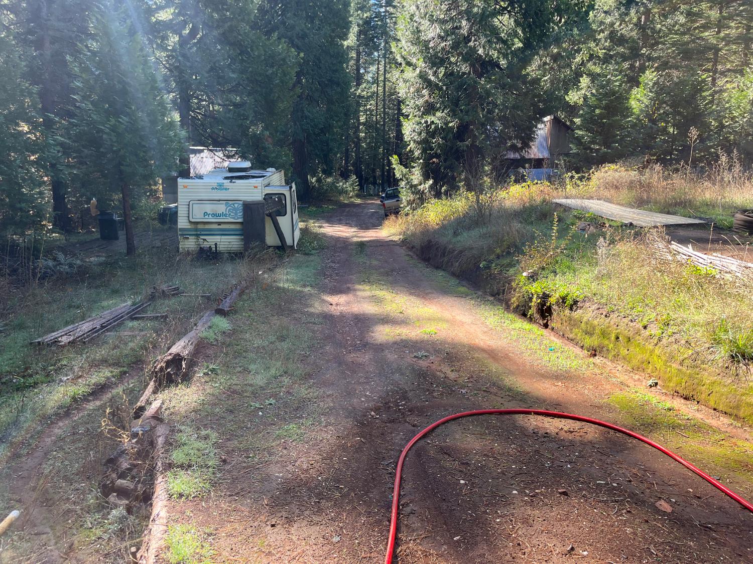 18035 Mobley Springs Road Nevada City, CA 95959 - Photo 13 of 50 a view of a backyard with table and chairs