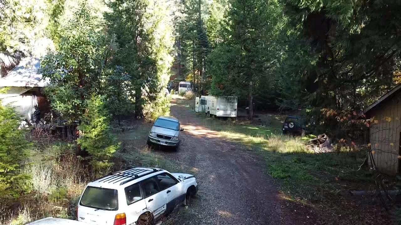 18035 Mobley Springs Road Nevada City, CA 95959 - Photo 38 of 50 a view of a house with backyard space and sitting area