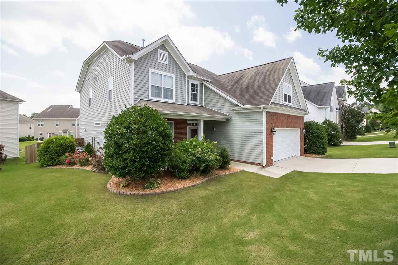 5160 Holly Ridge Farm Road Raleigh, NC 27616 - Photo 2 of 25 a front view of a house with a yard