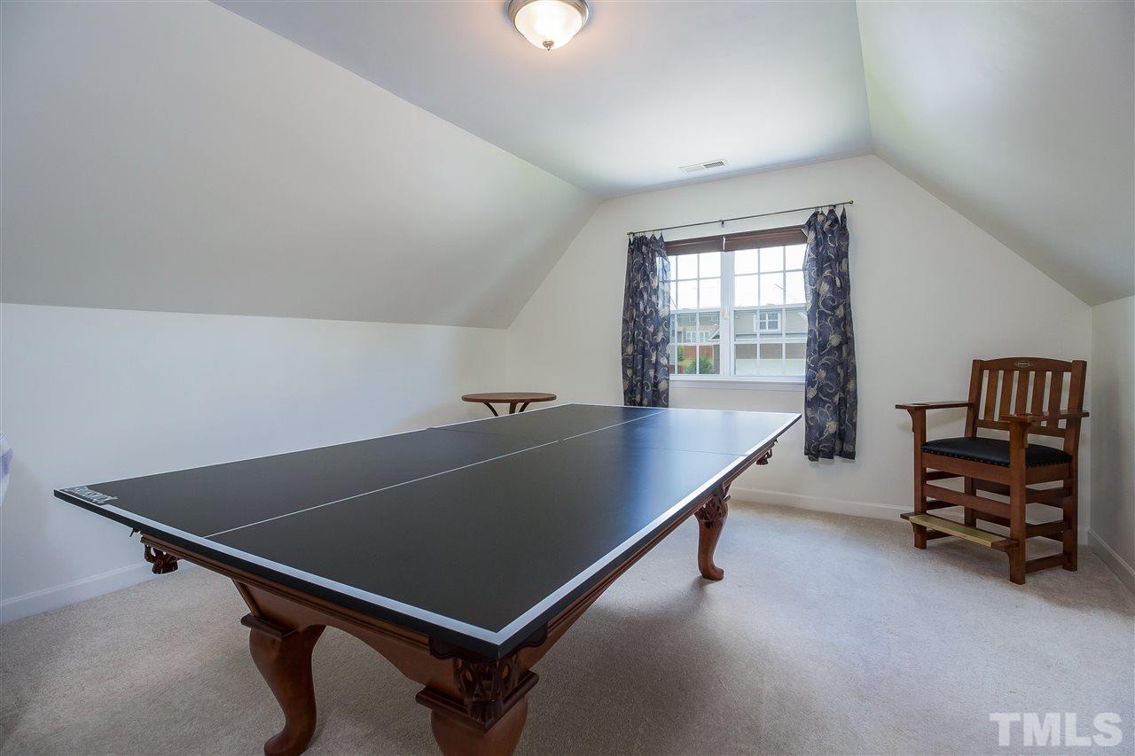 5160 Holly Ridge Farm Road Raleigh, NC 27616 - Photo 17 of 25 a room with pool table and windows