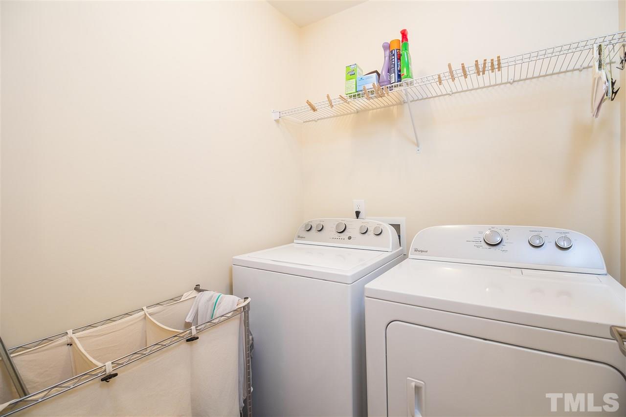 5160 Holly Ridge Farm Road Raleigh, NC 27616 - Photo 18 of 25 a utility room with dryer and washer