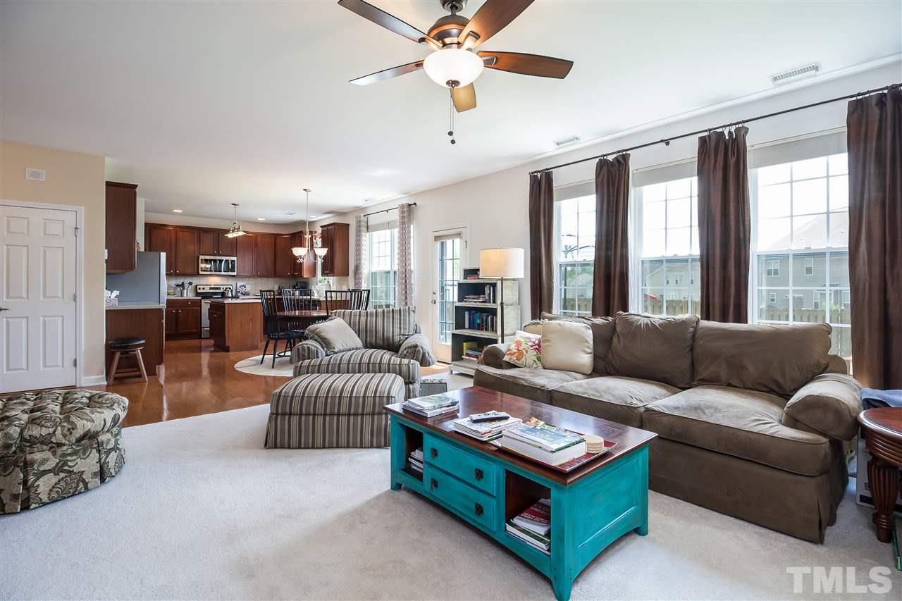 5160 Holly Ridge Farm Road Raleigh, NC 27616 - Photo 5 of 25 a living room with furniture and a large window