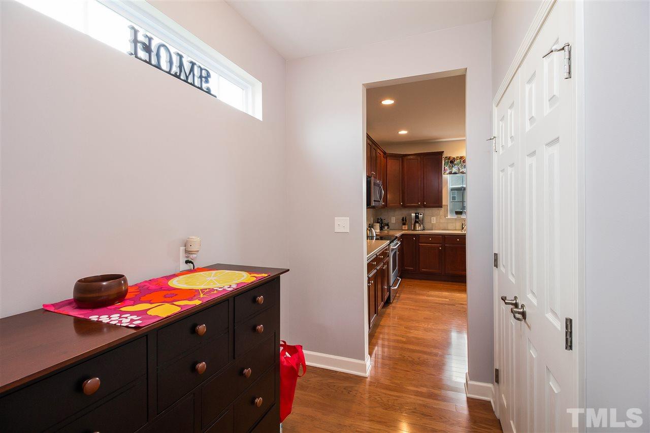 5160 Holly Ridge Farm Road Raleigh, NC 27616 - Photo 10 of 25 a bedroom with a bed and wooden floor