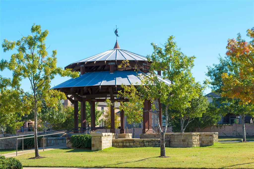 731 Lockridge Road Lantana, TX 76226 - Photo 35 of 38 The Town Green offers a lush setting for gathering with friends and neighbors. Featuring a gazebo, the Town Green serves as the site of community get togethers.
