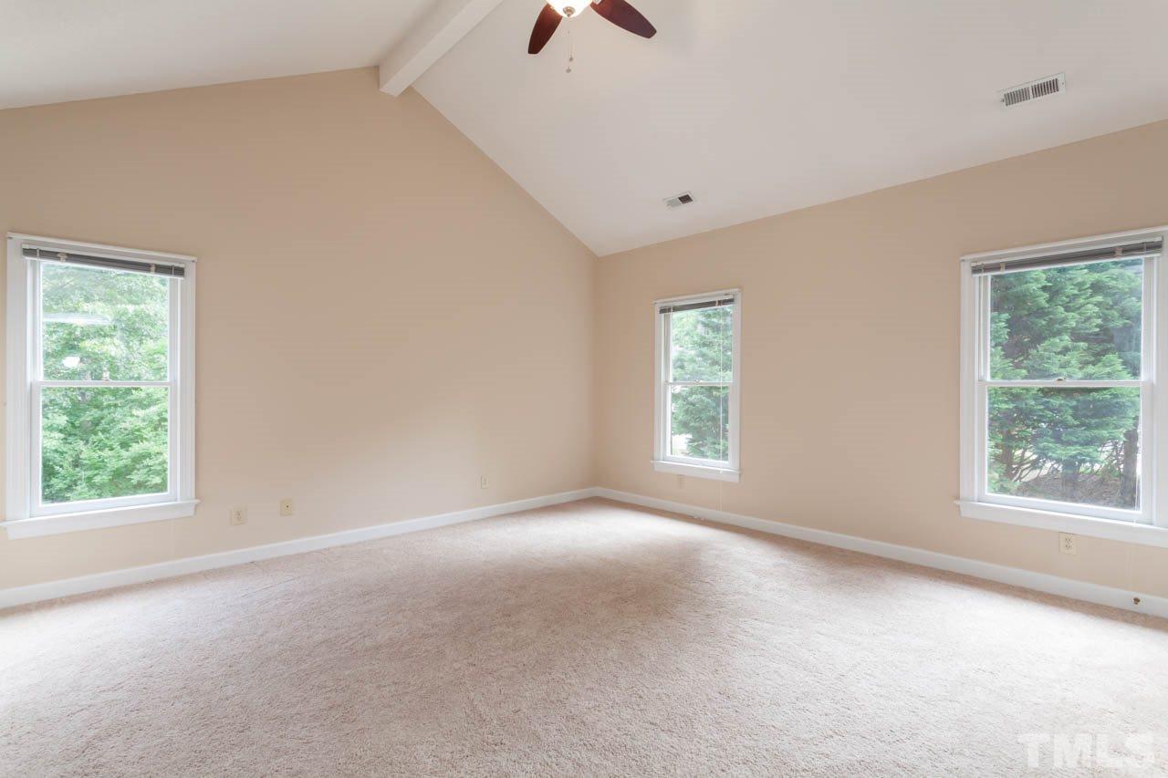 8016 Selfridge Court Raleigh, NC 27615 - Photo 15 of 25 an empty room with windows