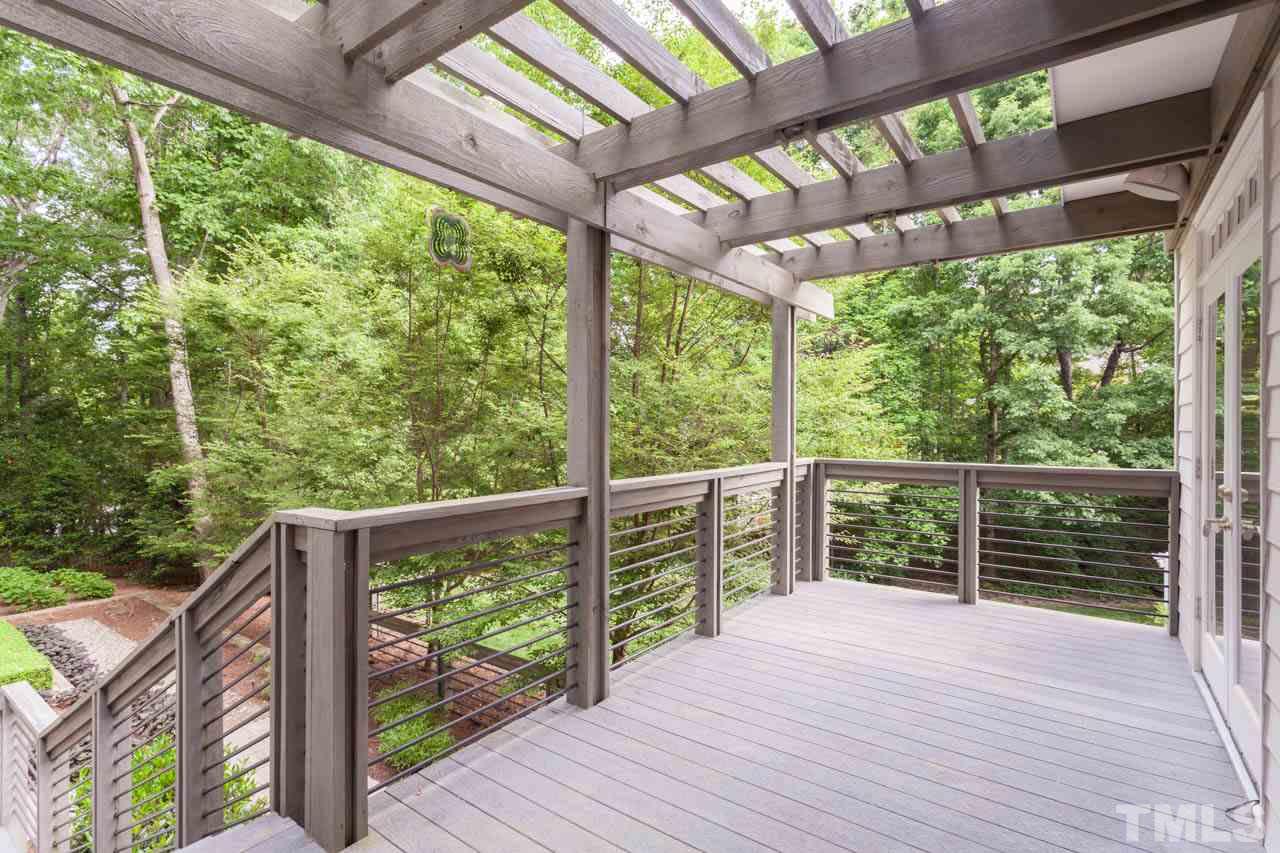 8016 Selfridge Court Raleigh, NC 27615 - Photo 20 of 25 a view of backyard with green space
