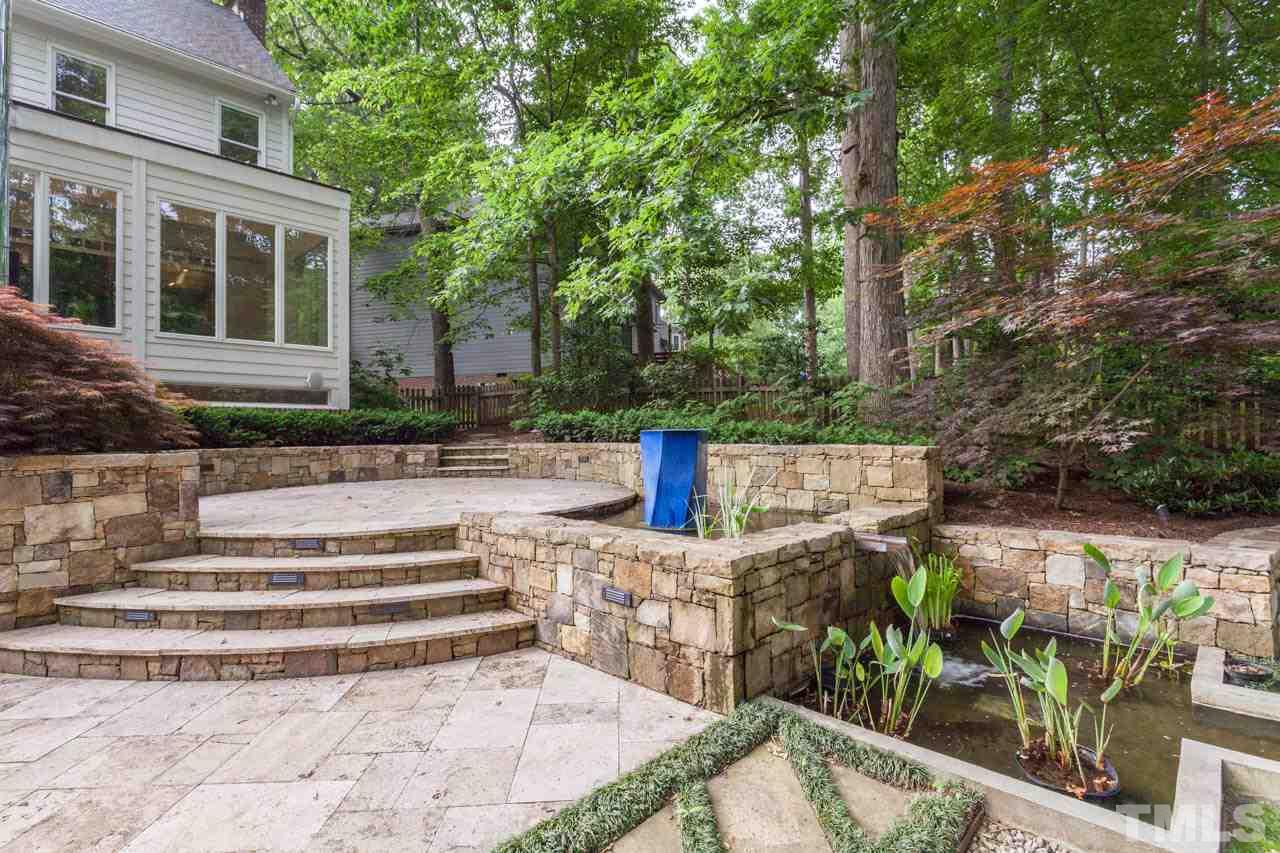 8016 Selfridge Court Raleigh, NC 27615 - Photo 24 of 25 a view of fountain in front of building