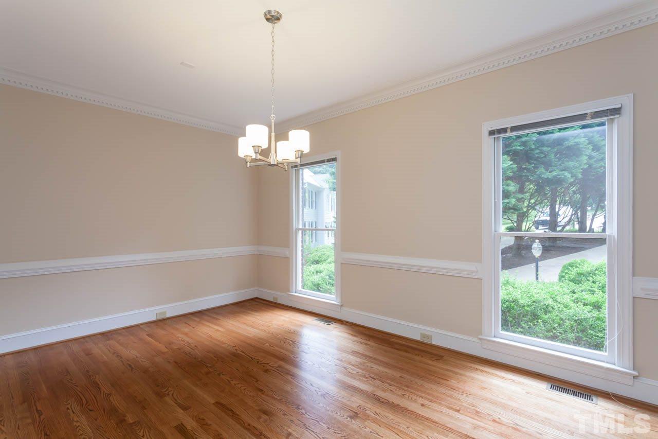 8016 Selfridge Court Raleigh, NC 27615 - Photo 9 of 25 a view of livingroom with window