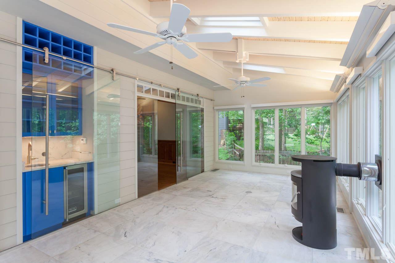 8016 Selfridge Court Raleigh, NC 27615 - Photo 10 of 25 a view of empty room with windows and outdoor view