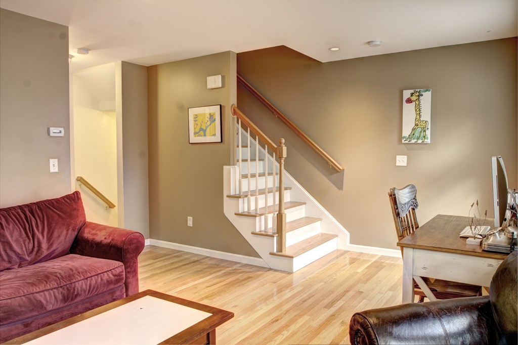 262 Littleton Road, Unit 22 Chelmsford, MA 01824 - Photo 15 of 30 a living room with furniture and a wooden floor