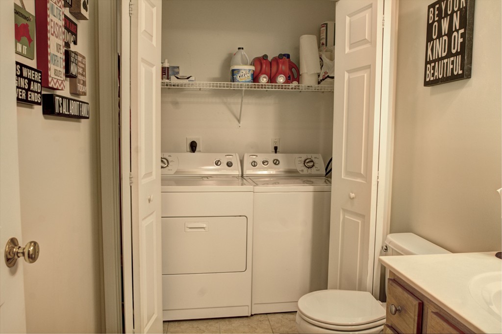 262 Littleton Road, Unit 22 Chelmsford, MA 01824 - Photo 16 of 30 a bathroom with a sink toilet and vanity