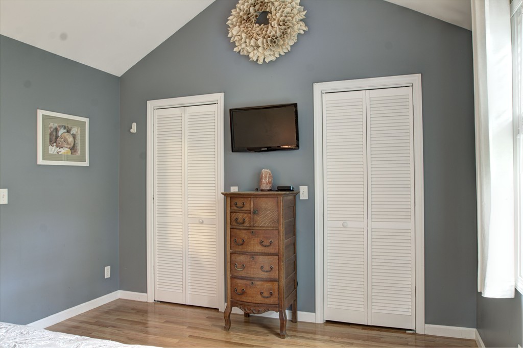262 Littleton Road, Unit 22 Chelmsford, MA 01824 - Photo 20 of 30 a view of a hallway with front door and bedroom