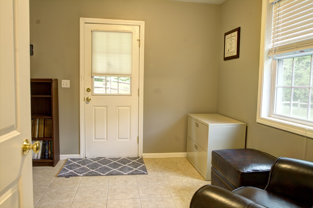262 Littleton Road, Unit 22 Chelmsford, MA 01824 - Photo 25 of 30 a living room with furniture and a window