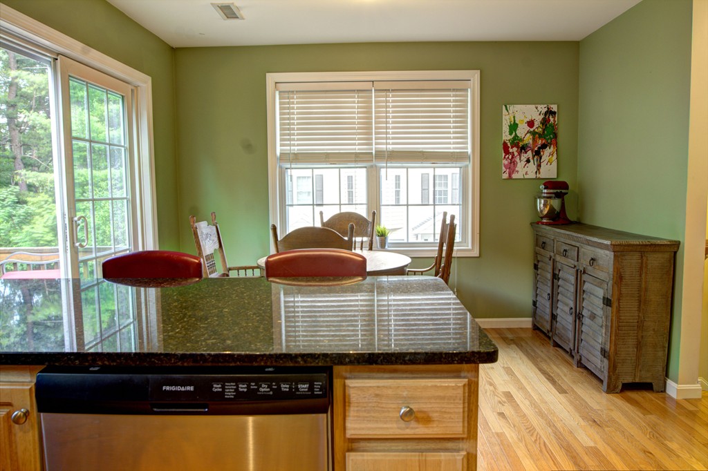 262 Littleton Road, Unit 22 Chelmsford, MA 01824 - Photo 9 of 30 a living room with furniture and a window