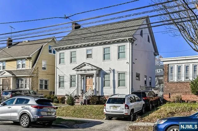 a car parked in front of a house