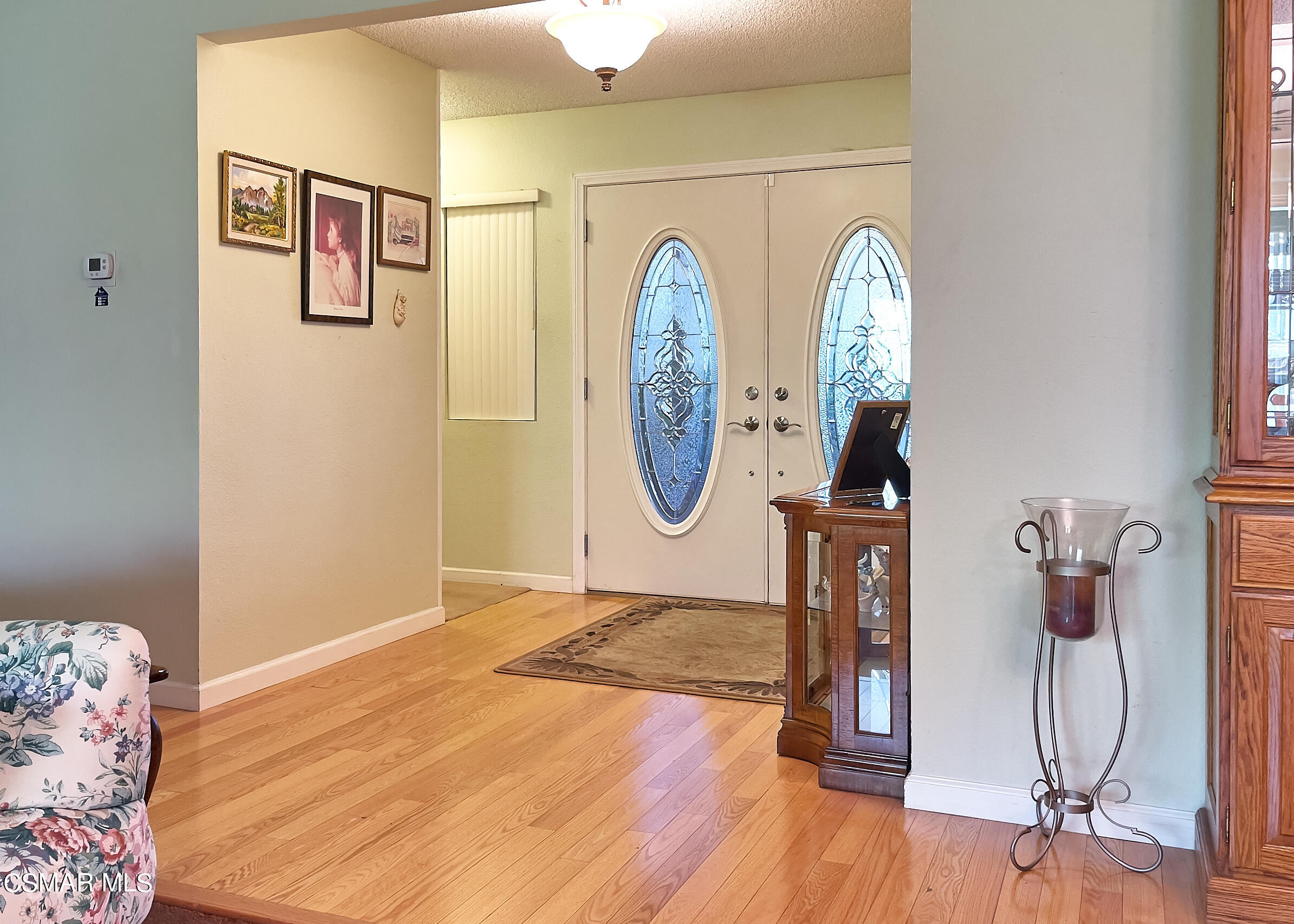 4110 Oakcliff Drive Moorpark, CA 93021 - Photo 12 of 67 a front view of a house with wooden floor