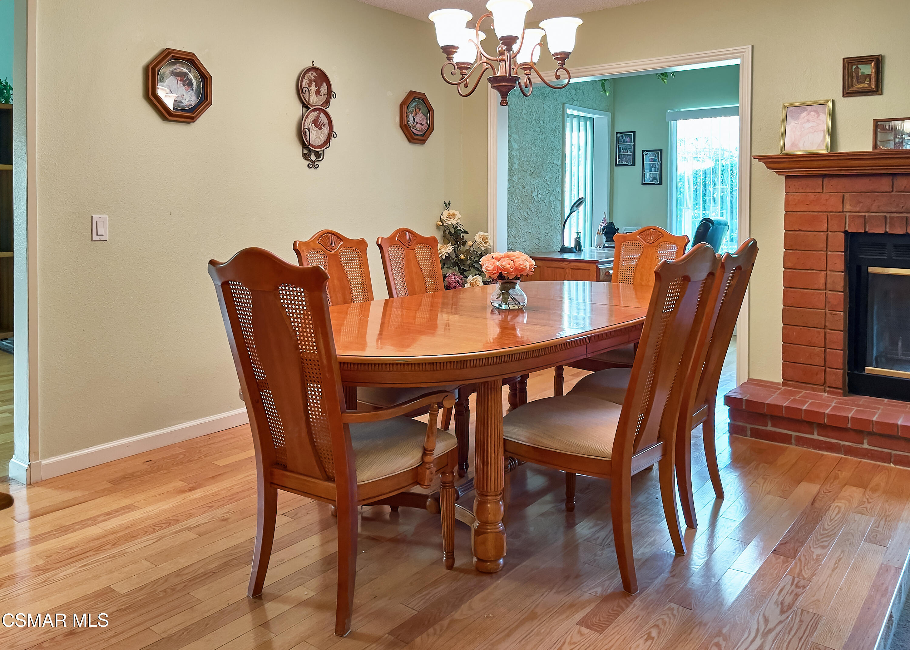 4110 Oakcliff Drive Moorpark, CA 93021 - Photo 18 of 67 a view of a dining room with furniture and wooden floor