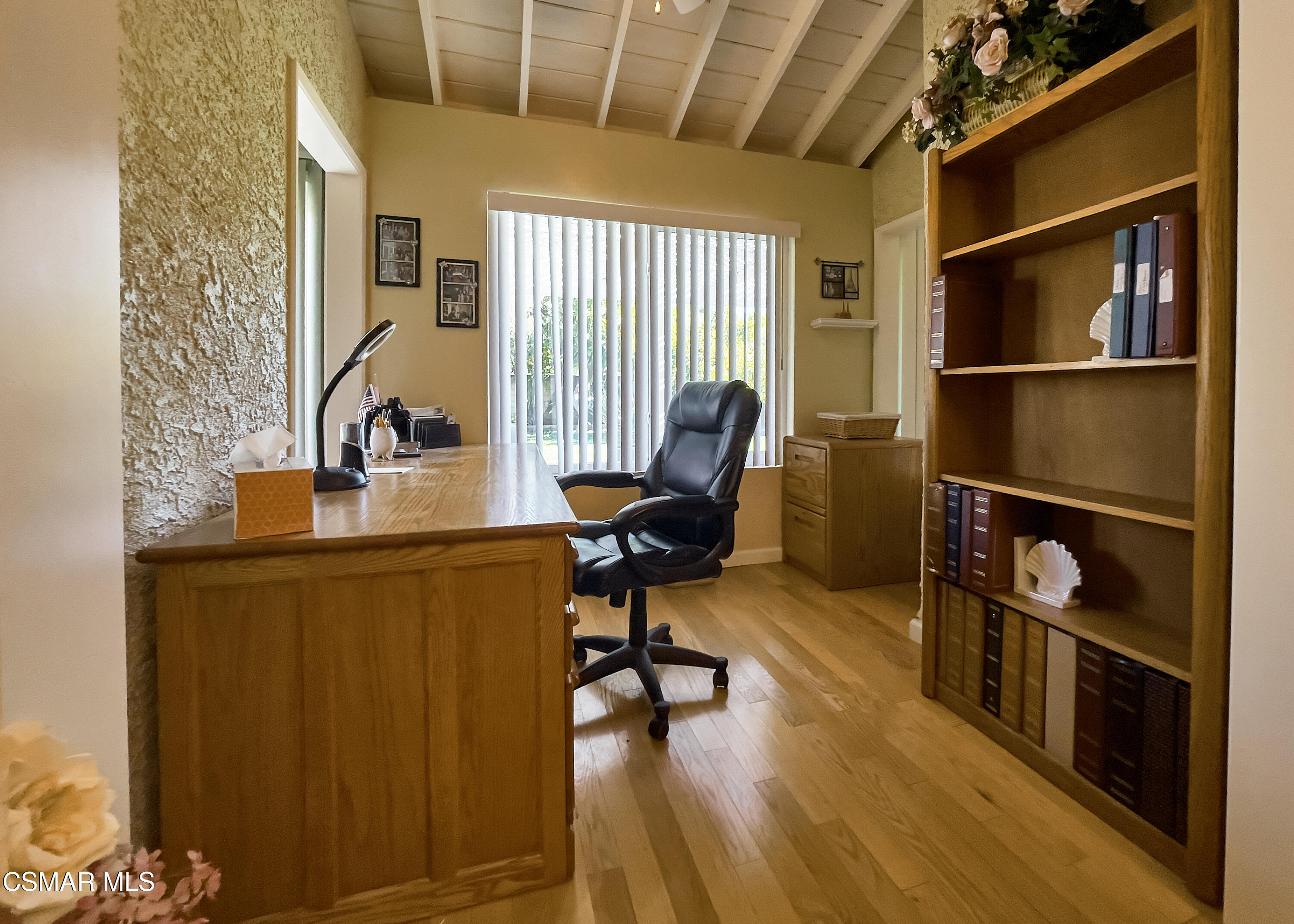 4110 Oakcliff Drive Moorpark, CA 93021 - Photo 20 of 67 a view of a workspace with furniture and a window